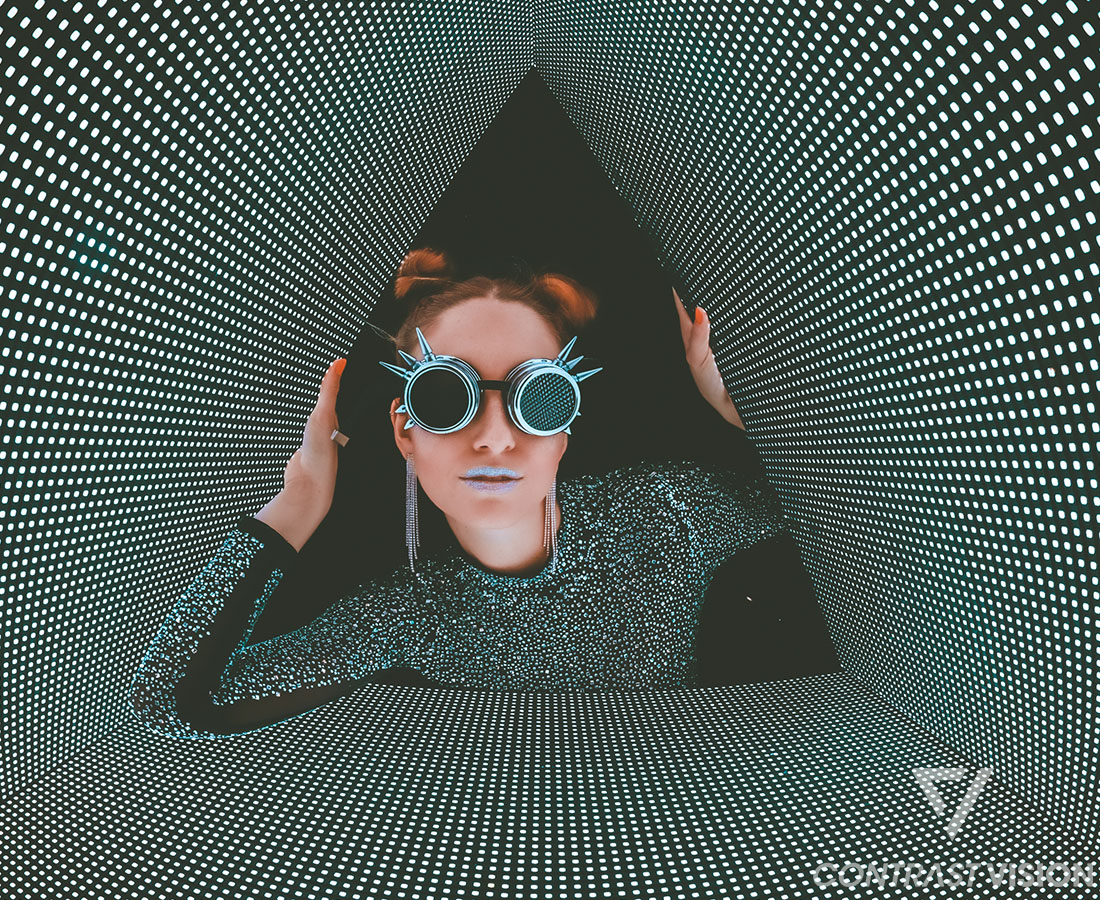 girl with glases in a futuristic environment